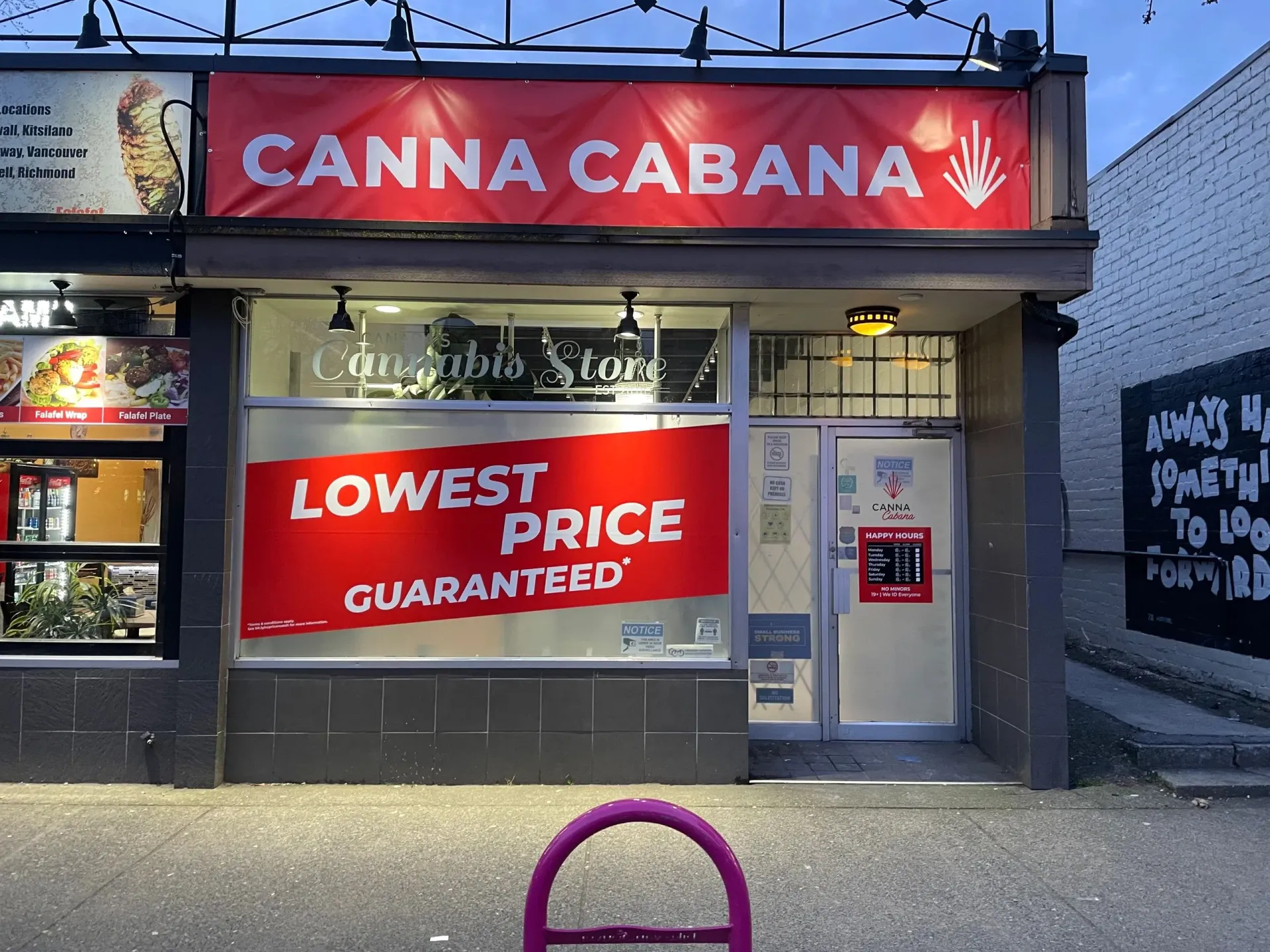 Professional retail storefront branding featuring bold signage and window graphics